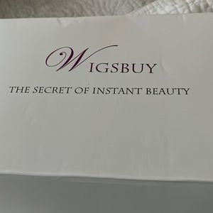 Brand New Wigsbuy platinum wig.